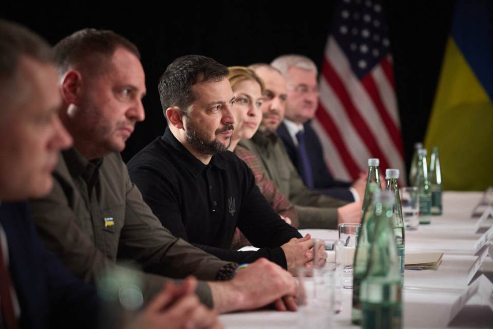 Volodymyr Zelensky and other officials at a meeting.
