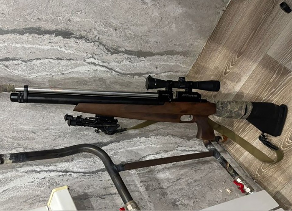 Rifle with scope.