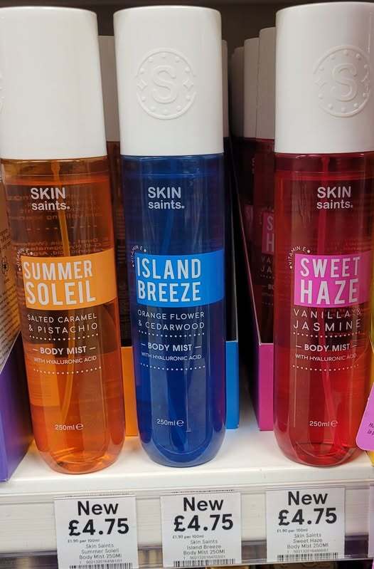 Three bottles of Skin Saints body mist: Summer Soleil, Island Breeze, and Sweet Haze.