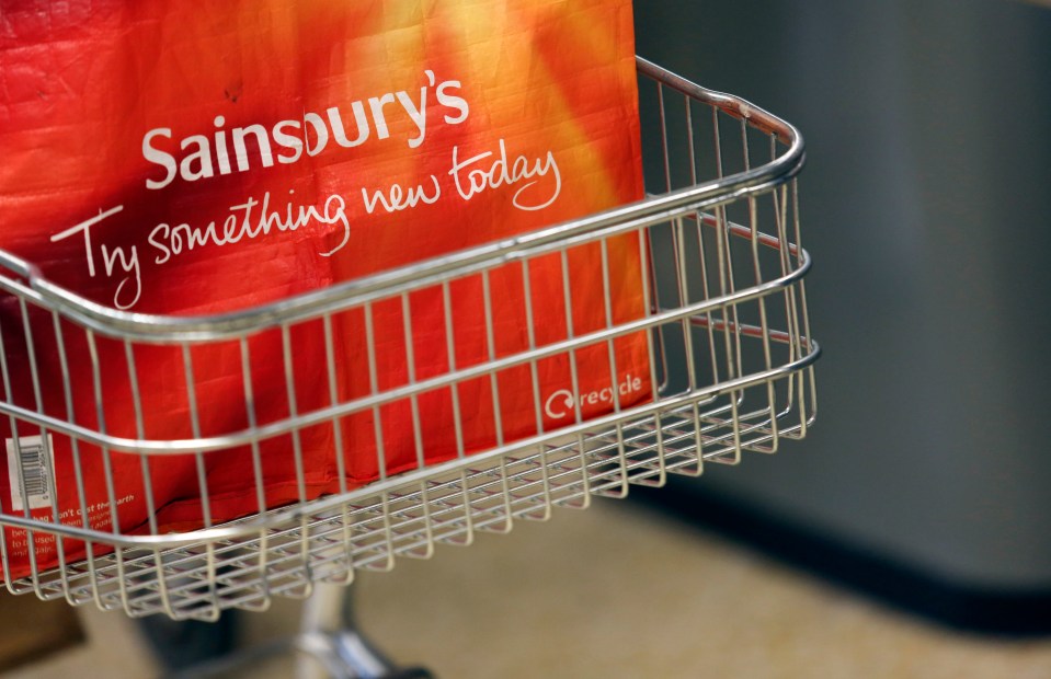 Sainsbury's reusable shopping bag in a shopping cart.