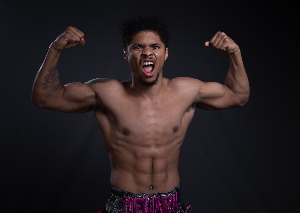 Portrait of Shakur Stevenson flexing his biceps.