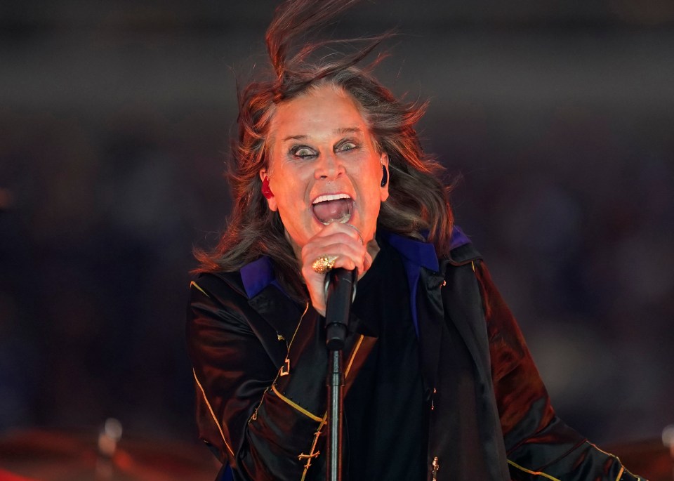 Ozzy Osbourne singing into a microphone.