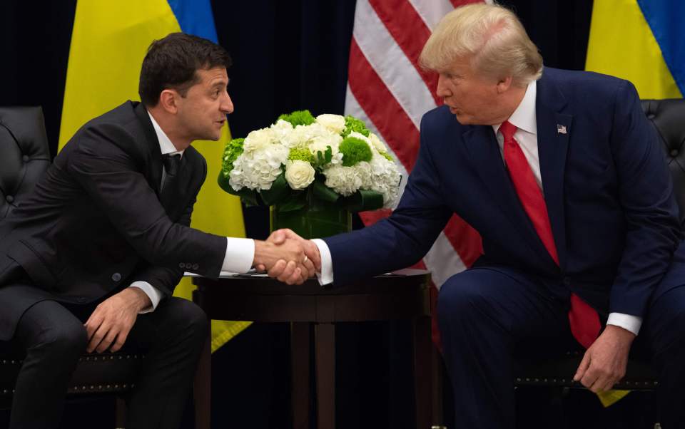 President Trump and President Zelensky shaking hands.