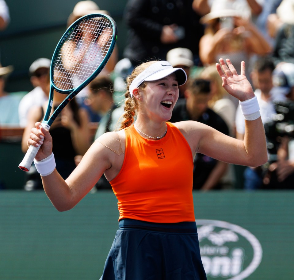 Mirra Andreeva celebrates a tennis victory.