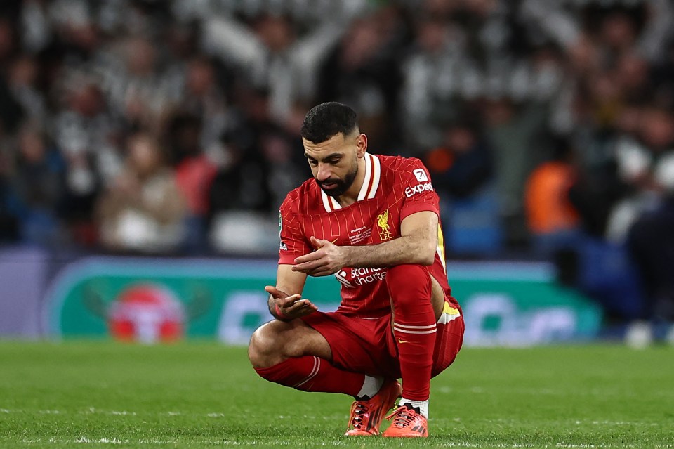 Mohamed Salah reacting to a Liverpool defeat.