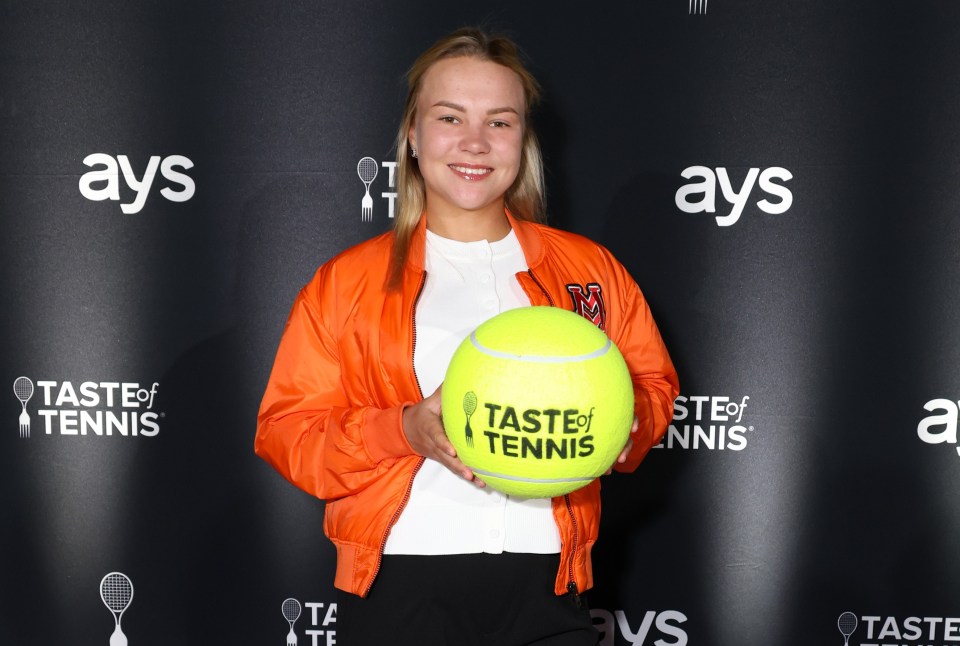 Diana Shnaider at Taste of Tennis Indian Wells holding a tennis ball.