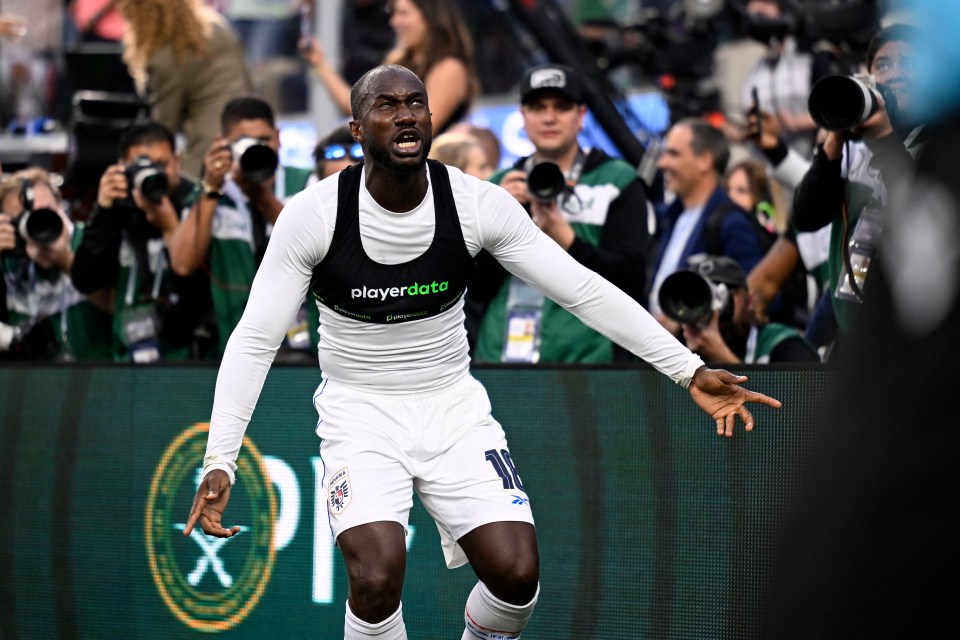 Soccer player Cecilio Waterman celebrating a goal.