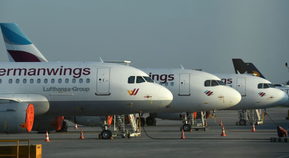 Lufthansa planes parked at Frankfurt Airport.