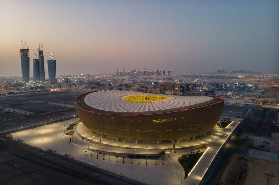 Aerial view of Lusail Stadium in Doha, Qatar at sunrise.