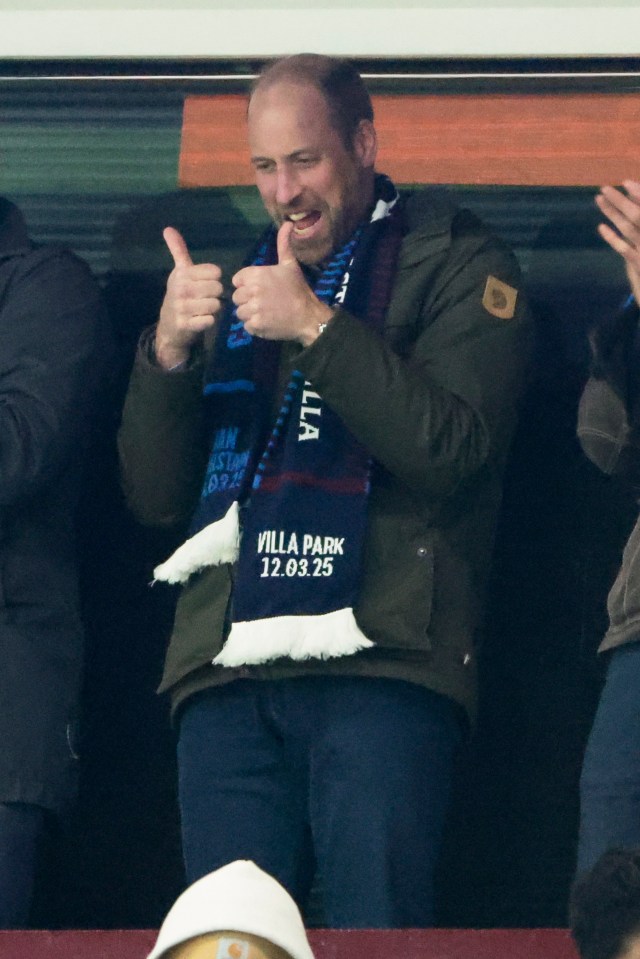 Prince William giving a thumbs-up at a soccer match.
