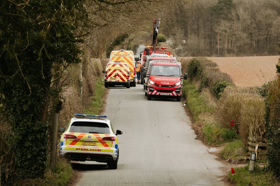 Emergency vehicles at the scene of a car accident.