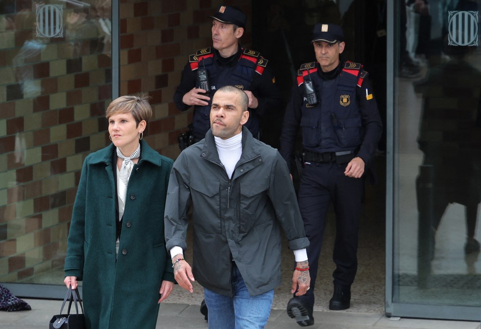 Dani Alves and his lawyer leaving prison following an overturned rape conviction.
