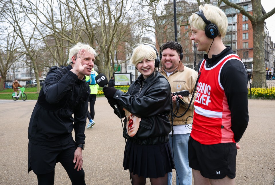 BBC Radio 1 presenters interviewing a runner during a Comic Relief challenge.