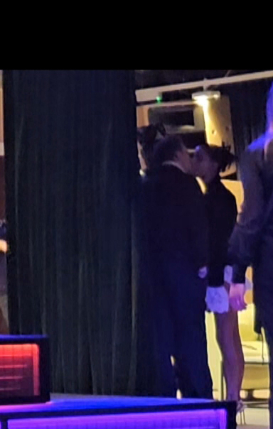 Maura Higgins and Danny Jones kissing at a Brit Awards after-party.