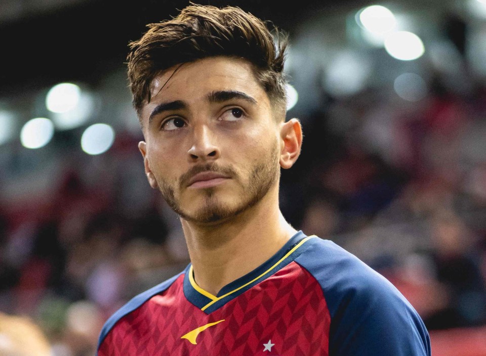 Josh Cavallo, Adelaide United player, in team uniform.