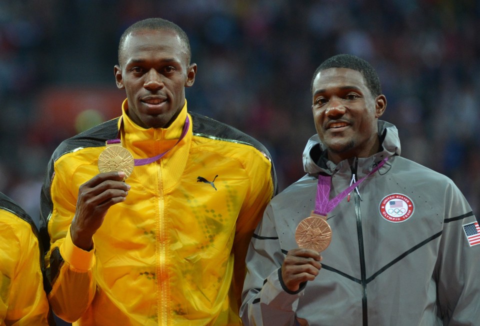 Usain Bolt, Yohan Blake, and Justin Gatlin on the men's 100m podium at the 2012 London Olympics.