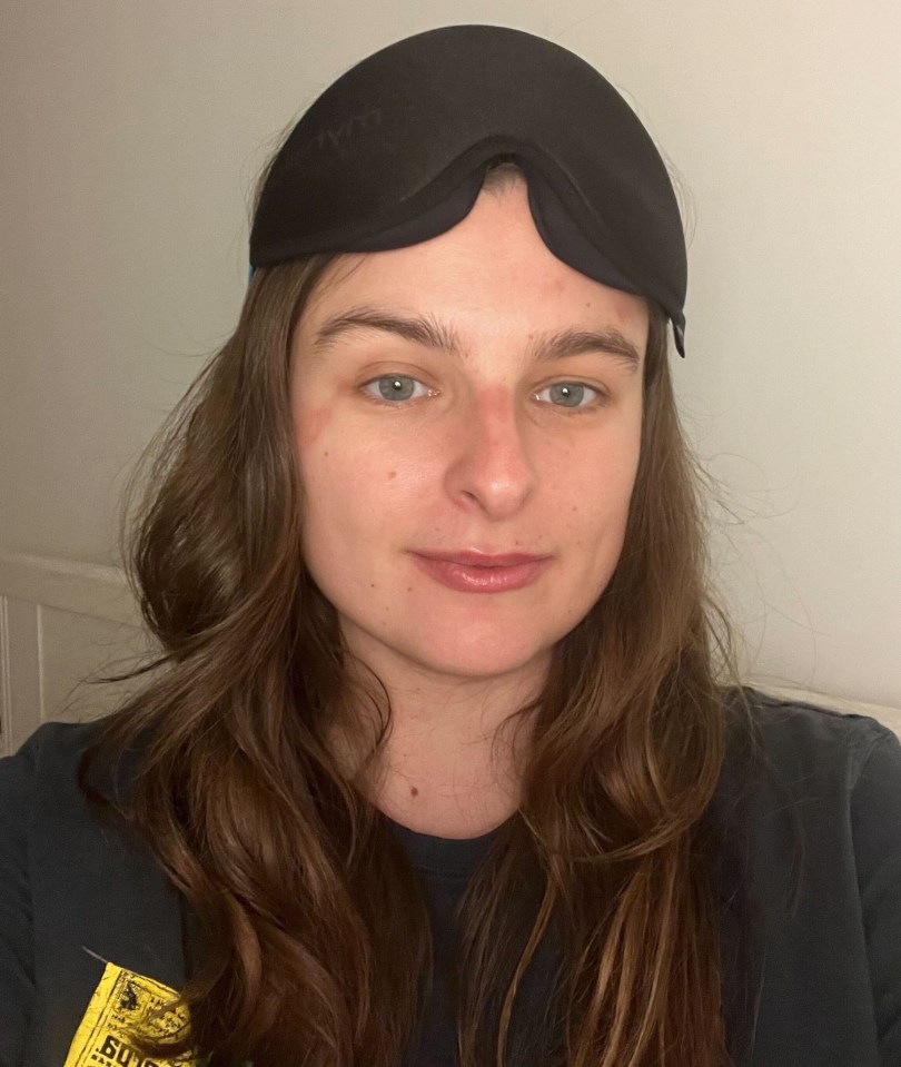 Woman wearing a sleep mask.