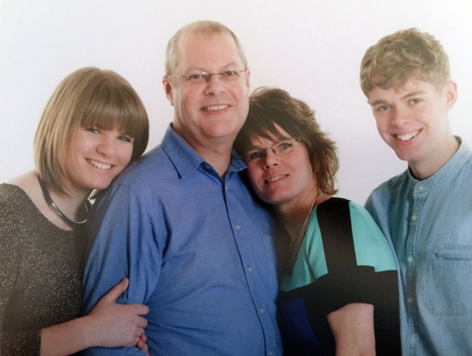 Photo of a family of four.