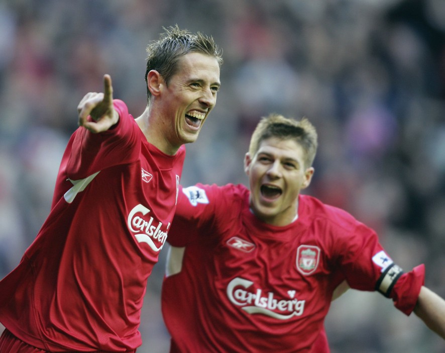 Peter Crouch and Steven Gerrard celebrating a Liverpool goal.