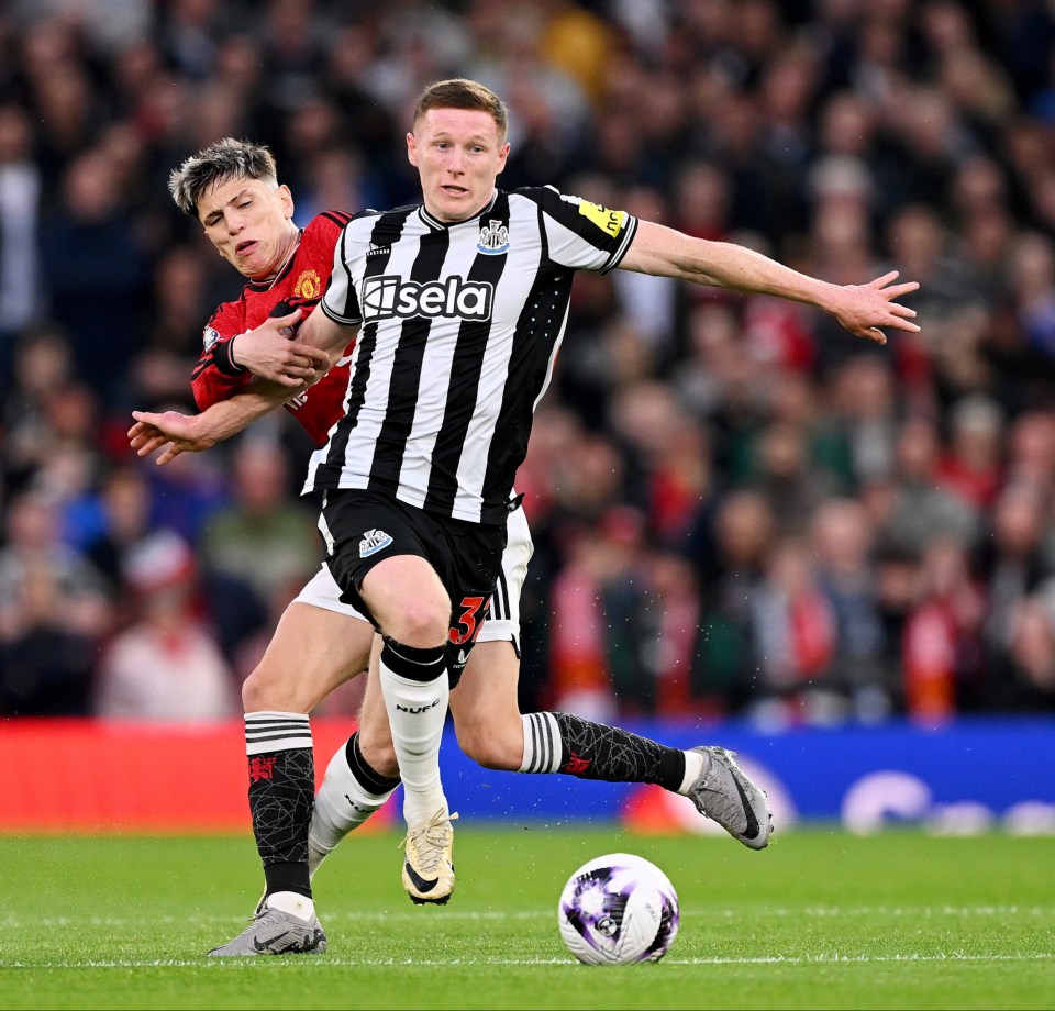 Alejandro Garnacho of Manchester United fouls Elliot Anderson of Newcastle United during a soccer match.