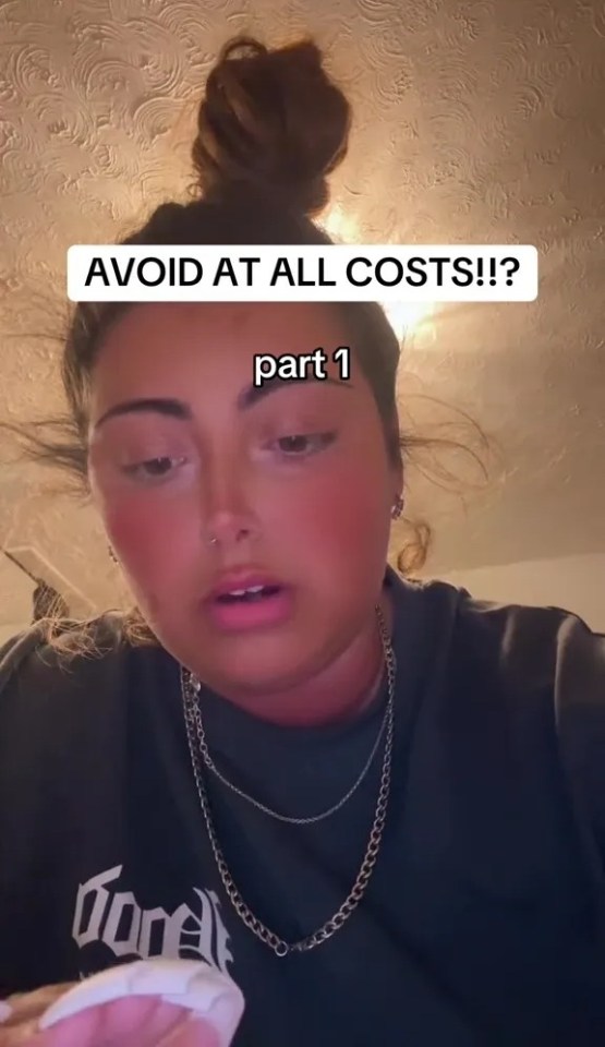 Woman reviewing her white acrylic nails, saying to avoid them.