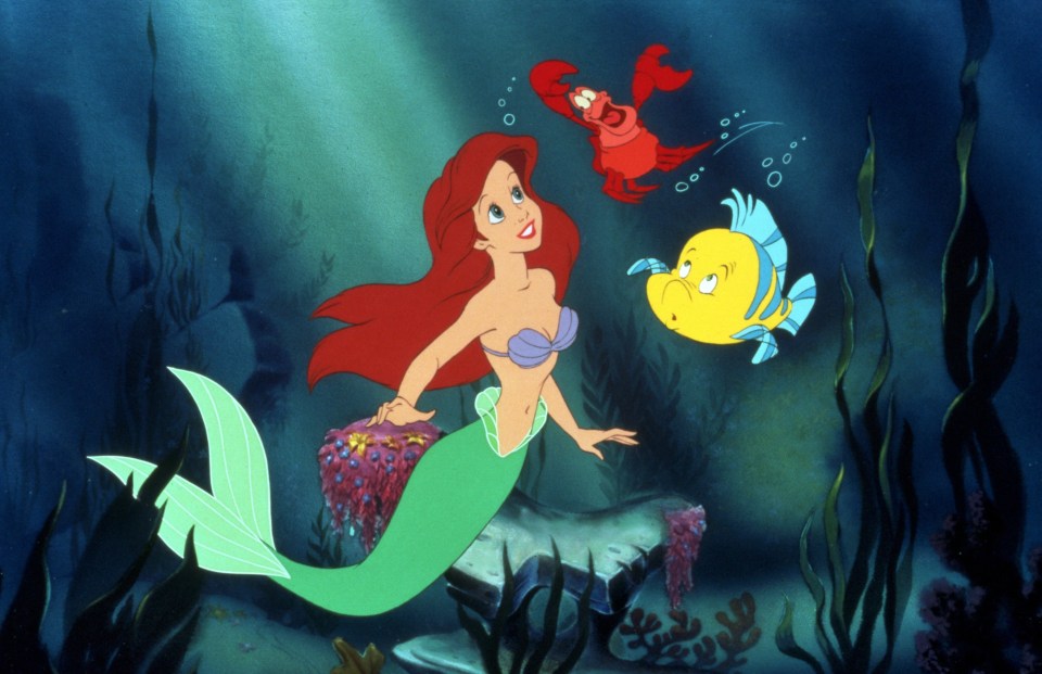 Film still of Ariel from Disney's *The Little Mermaid* with Sebastian and Flounder.