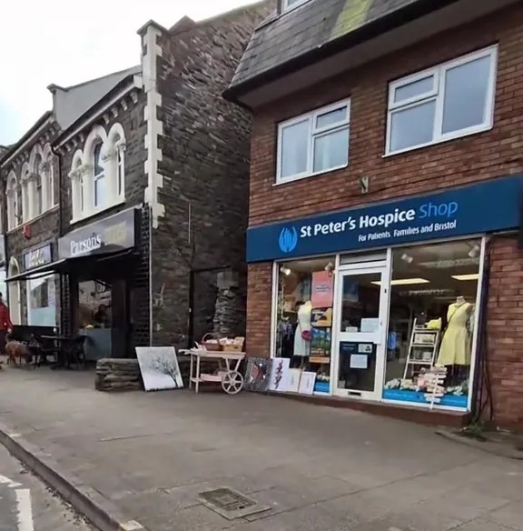A street-level view of St Peter's Hospice Shop, with text overlay indicating a £695 item was found there.
