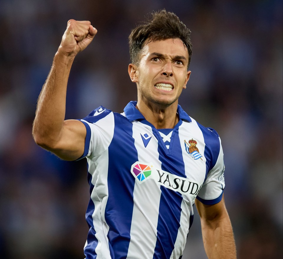 Martin Zubimendi of Real Sociedad celebrates scoring a goal.