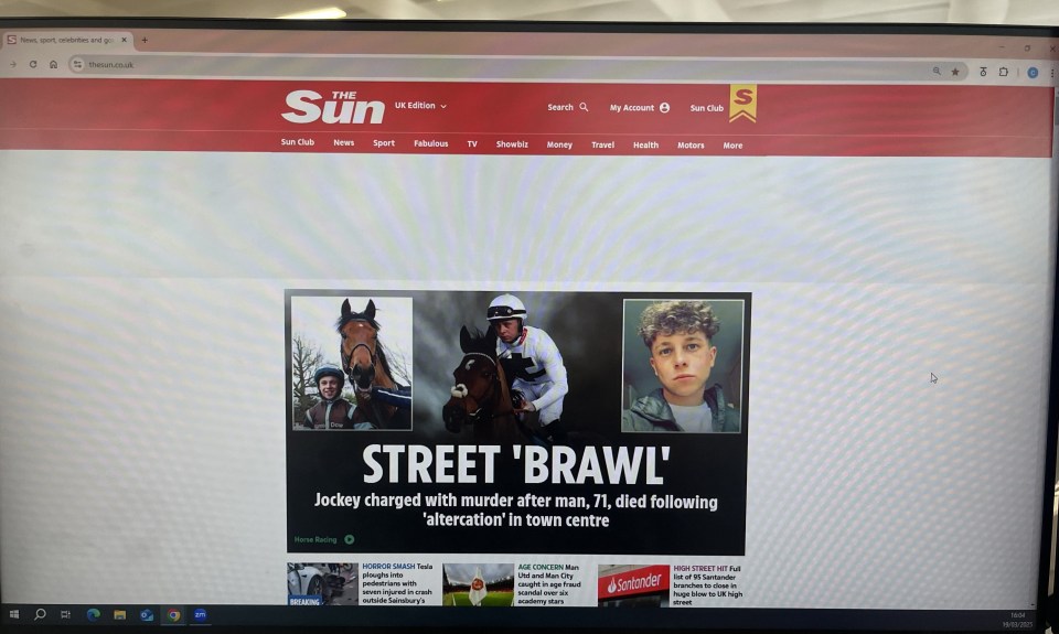 Computer screen displaying a news article about a jockey charged with murder.