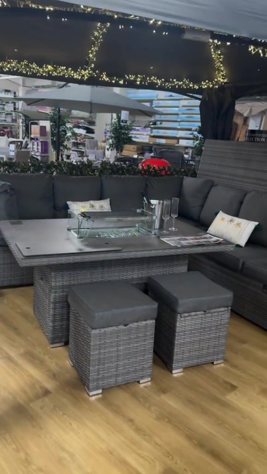 Outdoor patio furniture set with fire pit table.