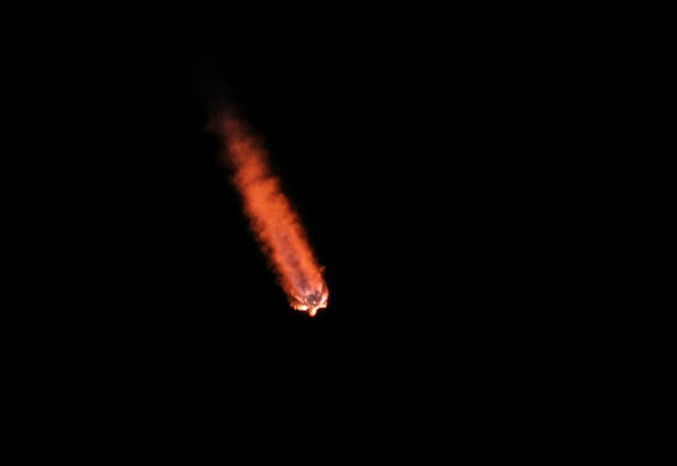 (FILES) Intuitive Machines' Athena lander on top of a SpaceX Falcon 9 rocket soars toward space after lifting off from Launch Complex 39A at NASA's Kennedy Space Center, Florida, February 26, 2025. More than fifty years passed between the last Apollo mission and America's return to the lunar surface, when the first ever private lander touched down last February. Now, starting March 2, two more missions are set to follow within a single week -- marking a bold push by NASA and its industry partners to make Moon landings a routine part of space exploration. (Photo by Gregg Newton / AFP) (Photo by GREGG NEWTON/AFP via Getty Images)
