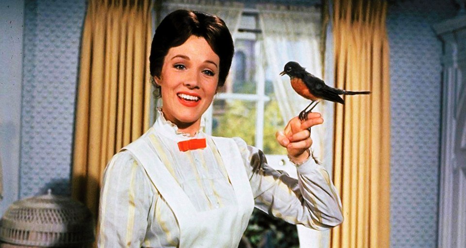 Julie Andrews as Mary Poppins with a robin.