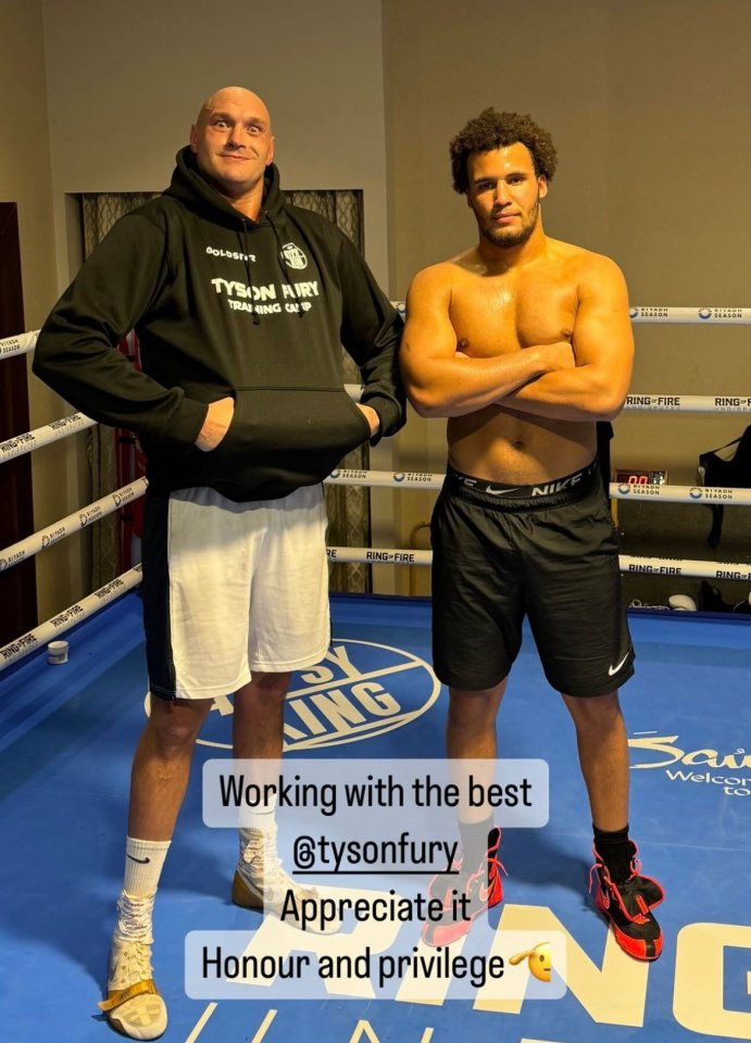 Tyson Fury and a boxer in boxing attire.