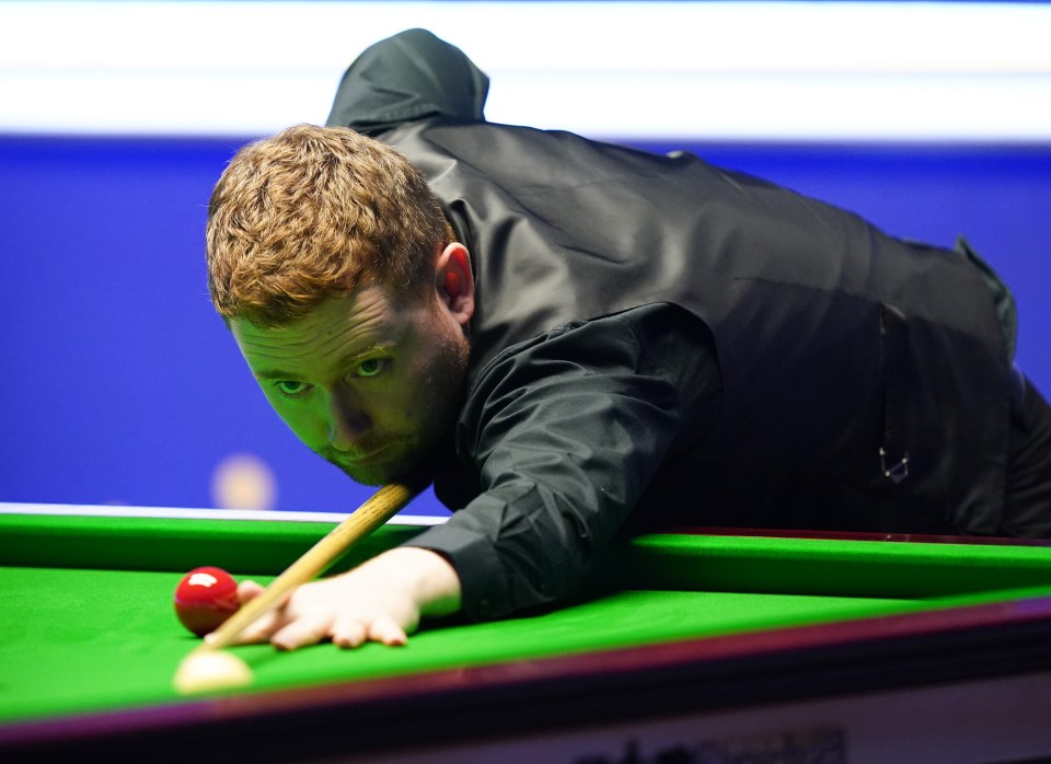 Ben Woollaston playing snooker.