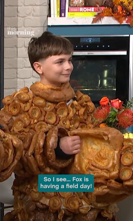 Boy in a Yorkshire pudding costume.