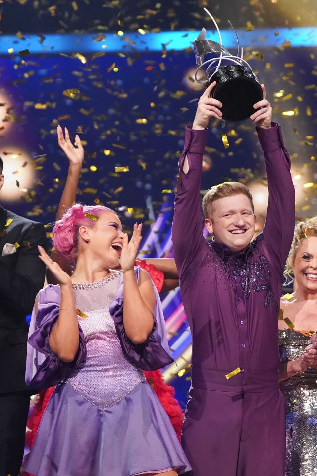Sam Aston and Molly Beth Lanaghan, winners of Dancing on Ice, holding the trophy.