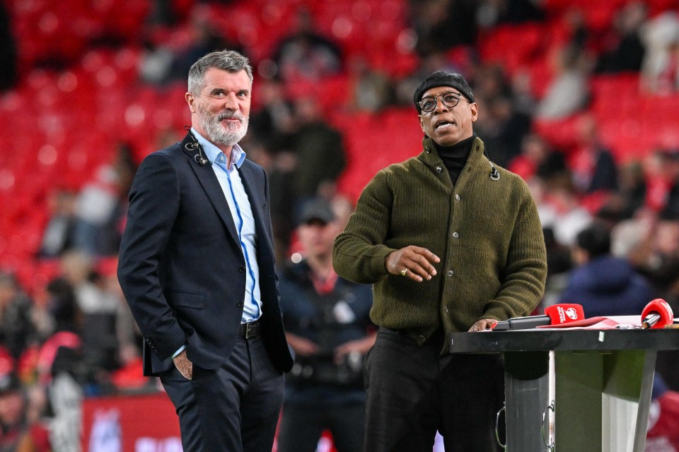 Roy Keane and Ian Wright at a soccer match.