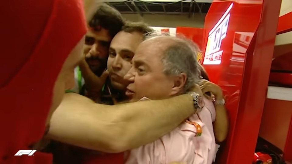 Felipe Massa's father embraced by family and friends after the 2008 Brazilian Grand Prix.