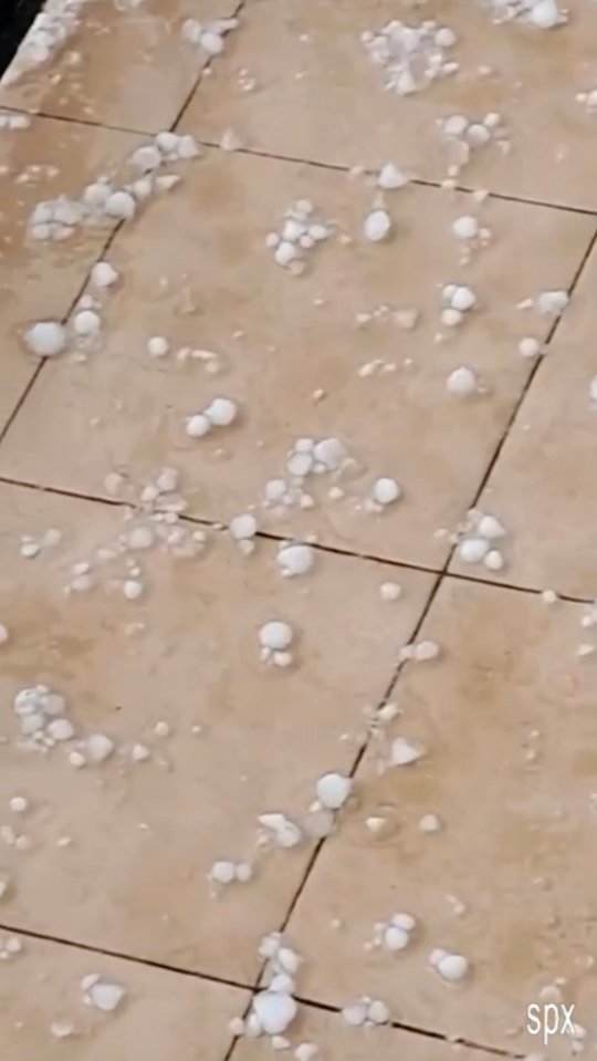 Hailstones on a tiled surface.