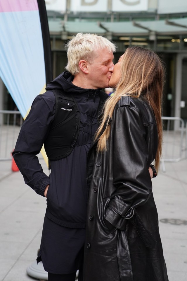 Radio 1 presenter Jamie Laing poses for a photo with his wife Sophie Habboo, outside BBC Broadcasting House in London before his Red Nose Day Run, a 150+ mile run from London to Manchester to raise money for Comic Relief. Picture date: Monday March 17, 2025. PA Photo. See PA story SHOWBIZ ComicRelief. Photo credit should read: Ian West/PA Wire