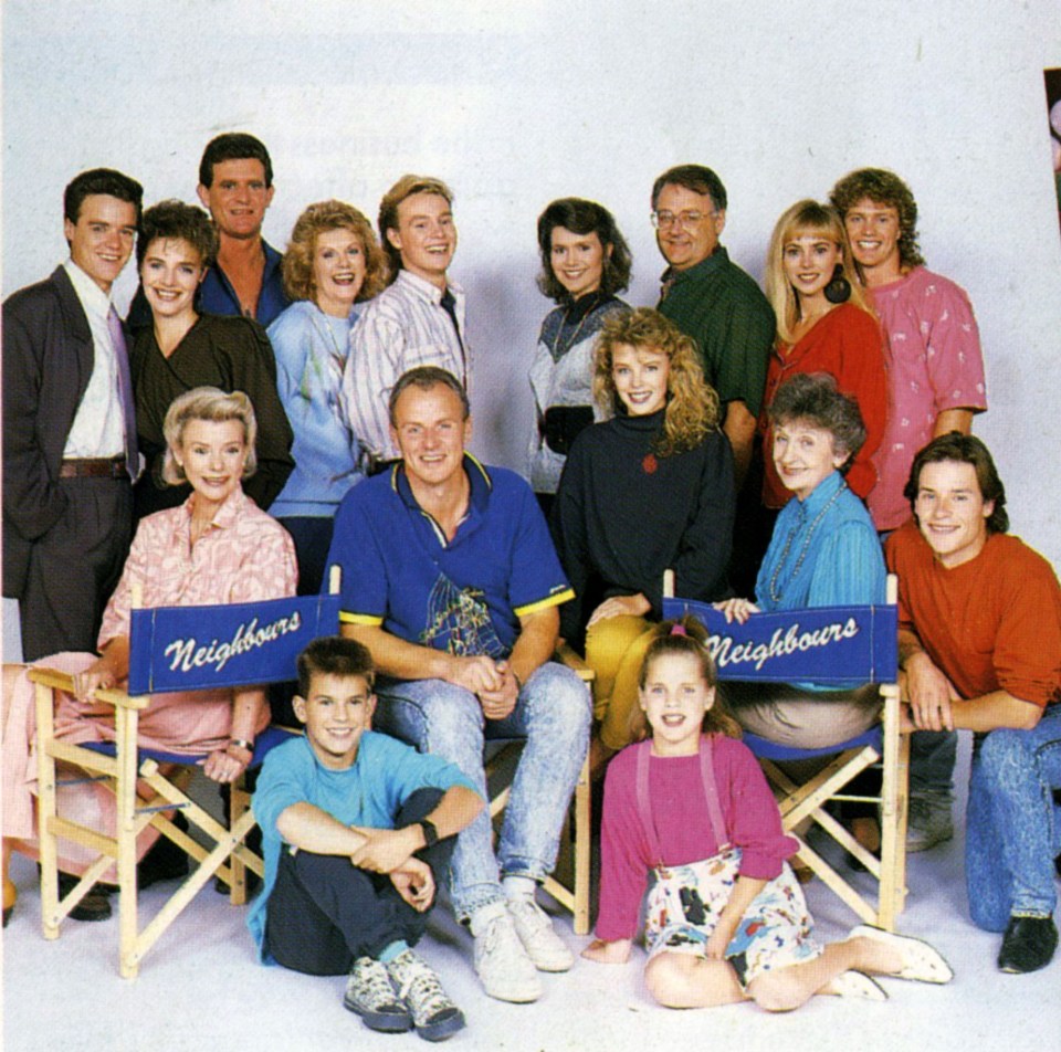 Early cast photo of the TV show Neighbours, featuring Jason Donovan and Kylie Minogue.
