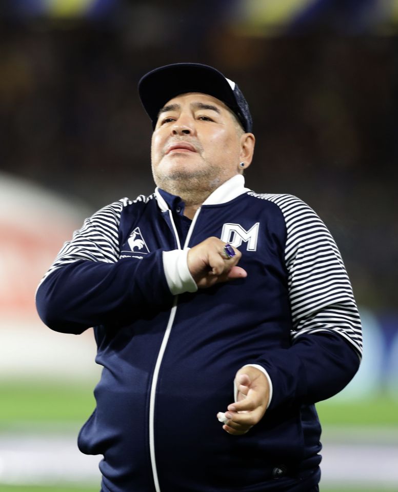 Diego Maradona at a football match.
