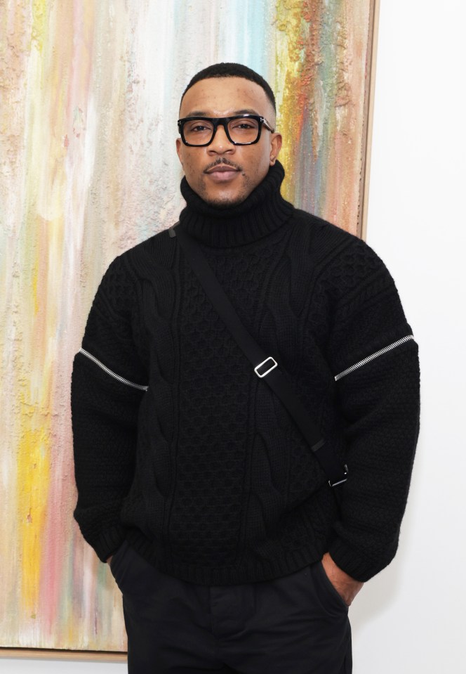 Ashley Walters at an art gallery.