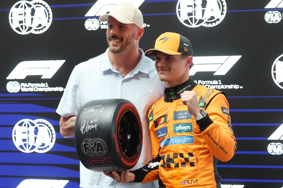 Kyle Chalmers presents the Pirelli Pole Position Award to Lando Norris.