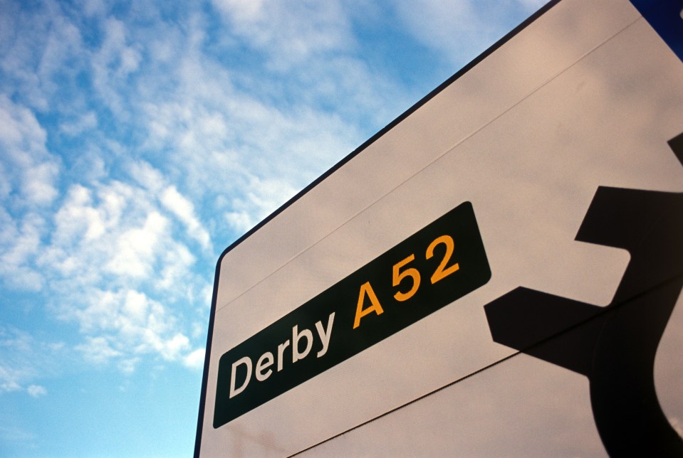Road sign indicating Derby A52.