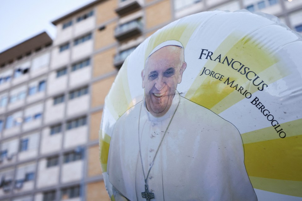 Balloon with Pope Francis' image.