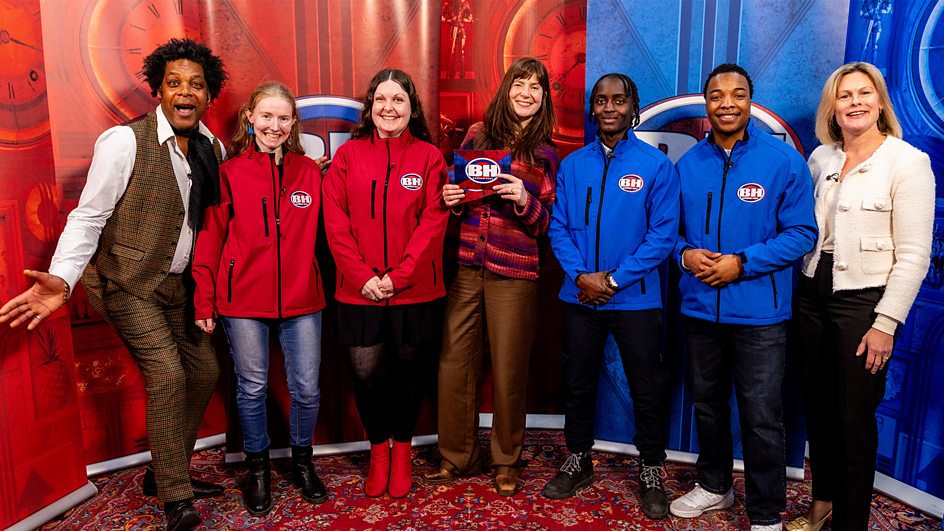 Group photo of Bargain Hunt contestants and presenters.