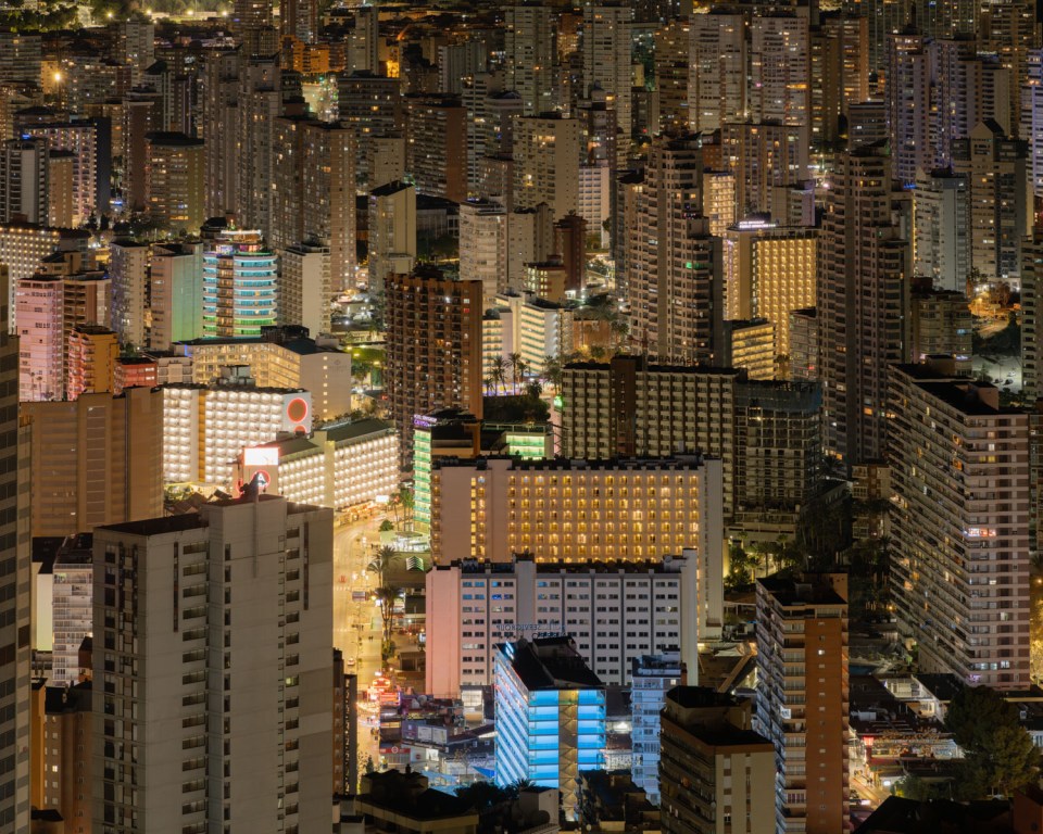 Night view of Benidorm's densely packed high-rise buildings.