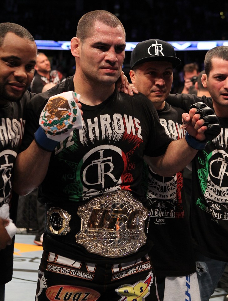 Cain Velasquez celebrates winning the UFC heavyweight championship.