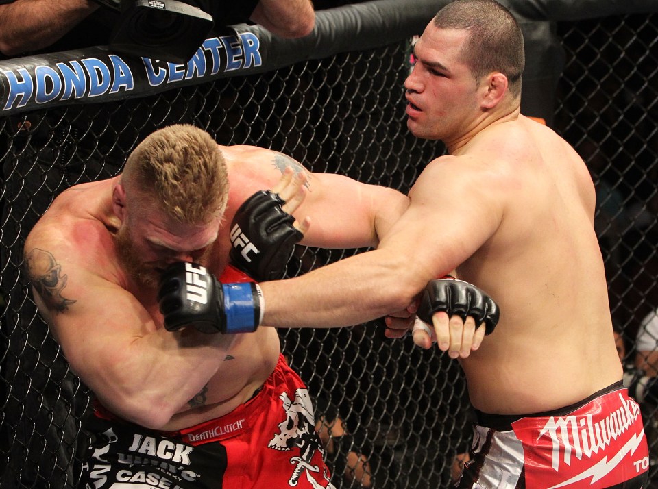 Cain Velasquez punches Brock Lesnar in a UFC match.